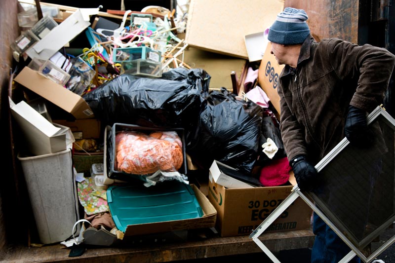 Rubbish R Us team loading waste — full service, we do all the lifting